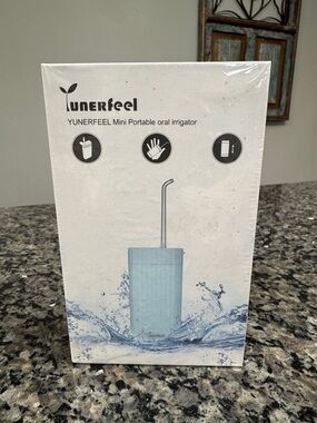 Portable mini Oral Irrigator waterpik NEW factory sealed